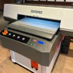 Zestones 90×60 üç kafalı I3200 UV flatbed baskı makinesinin perspektif görünümü